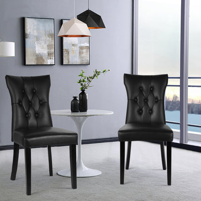 Two black PU leather dining chairs with buttons