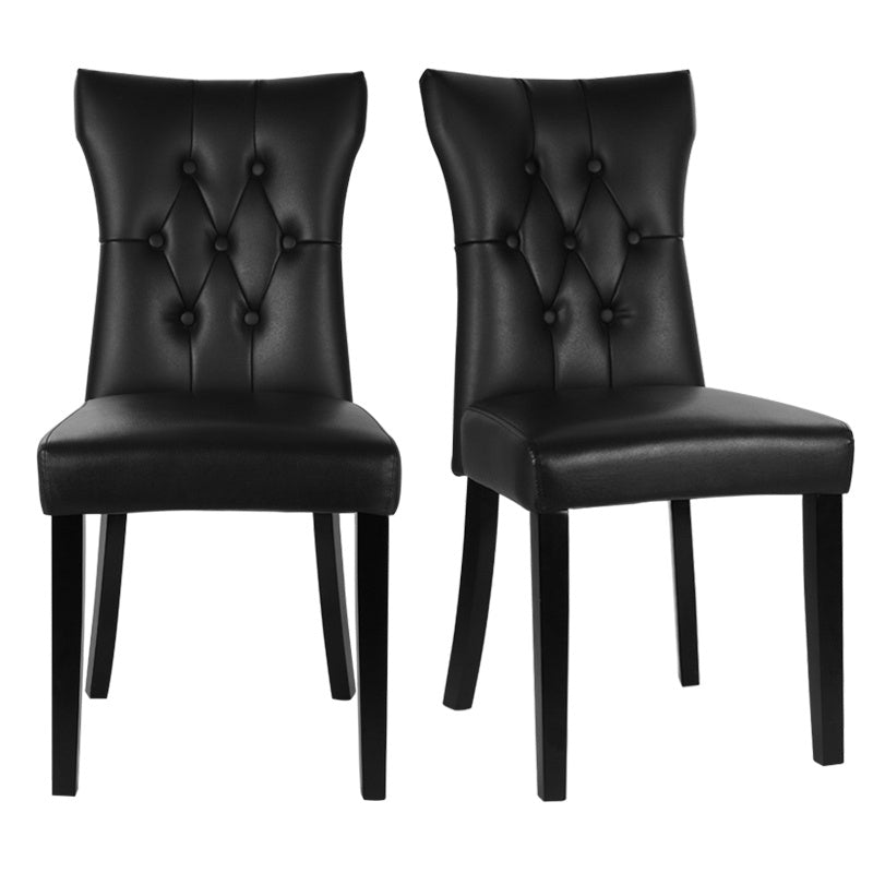 Two black PU leather dining chairs with buttons