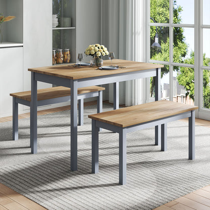 Three contemporary wood dining tables and benches in grey